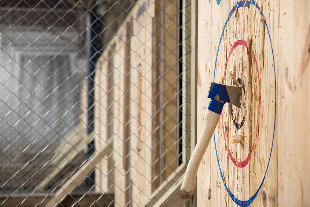 Axe targets behind fencing